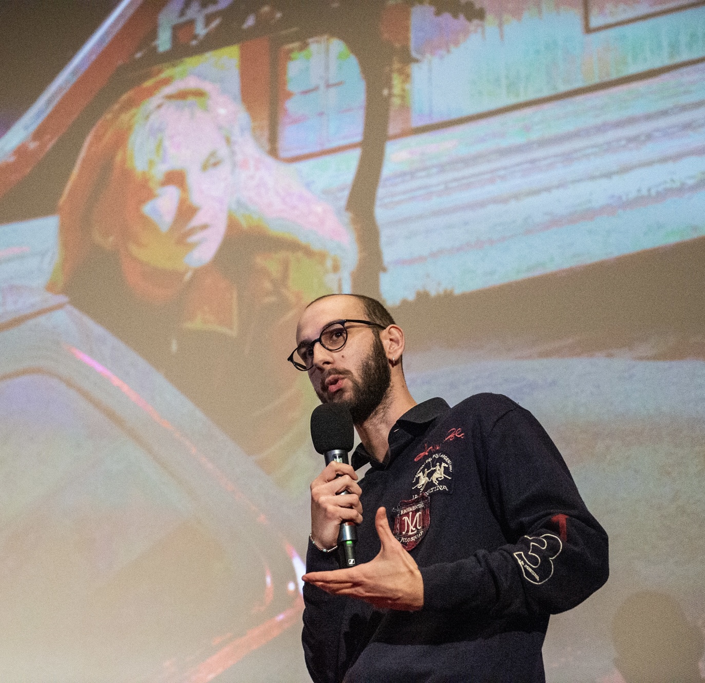 Alexandru Oita presenting a film